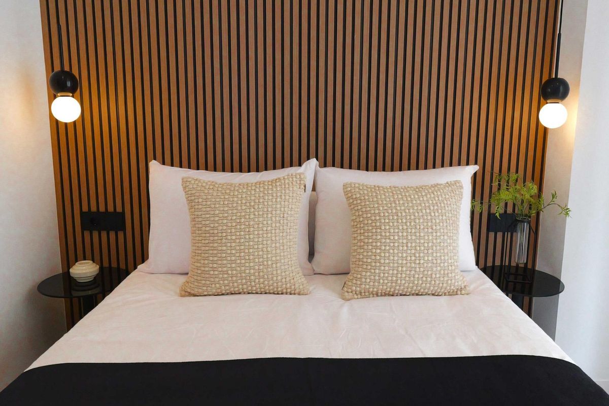 Close-up view of a modern bedroom layout featuring elegant decor in a 2-bed apartment, La Manga del Mar Menor.