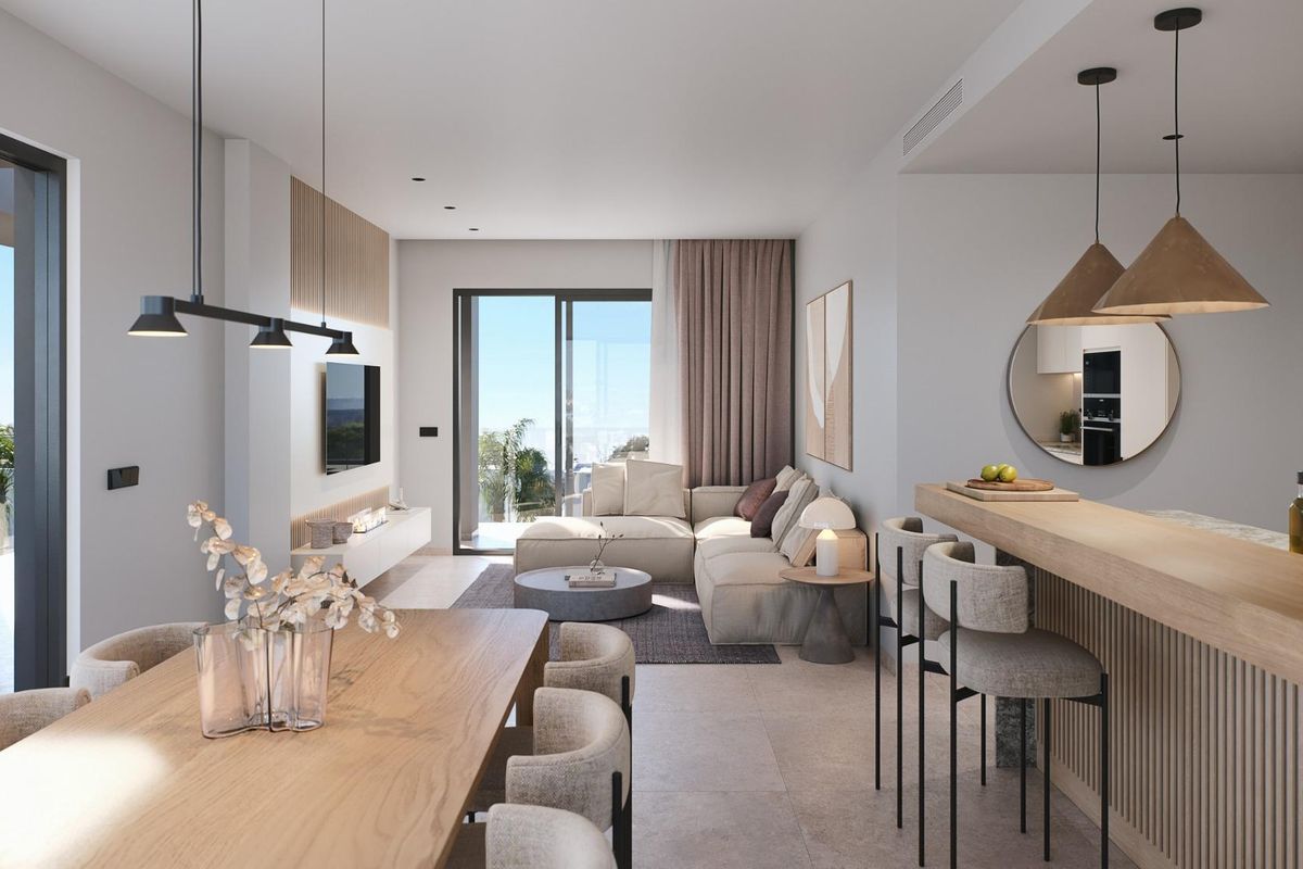 Heldere woonkamer met een gezellige zithoek, onderdeel van een penthouse in Torre Pacheco.