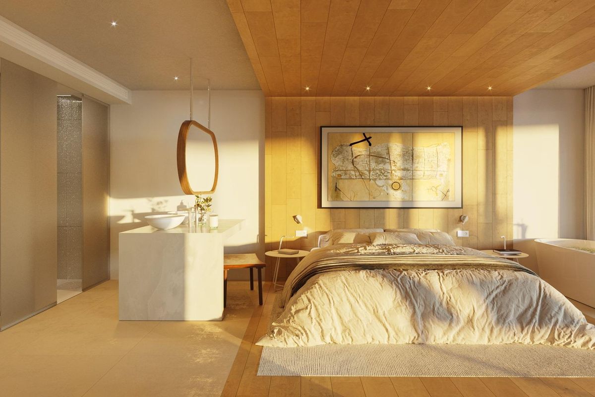 Luxueuze slaapkamer met ensuite badkamer en modern ontwerp, vol natuurlijk licht in Fuengirola.