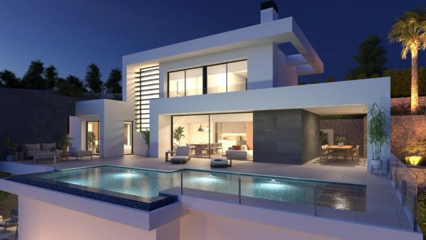 Modern 3-bed villa in Benitachell, Costa Blanca, featuring an illuminated pool area at night.