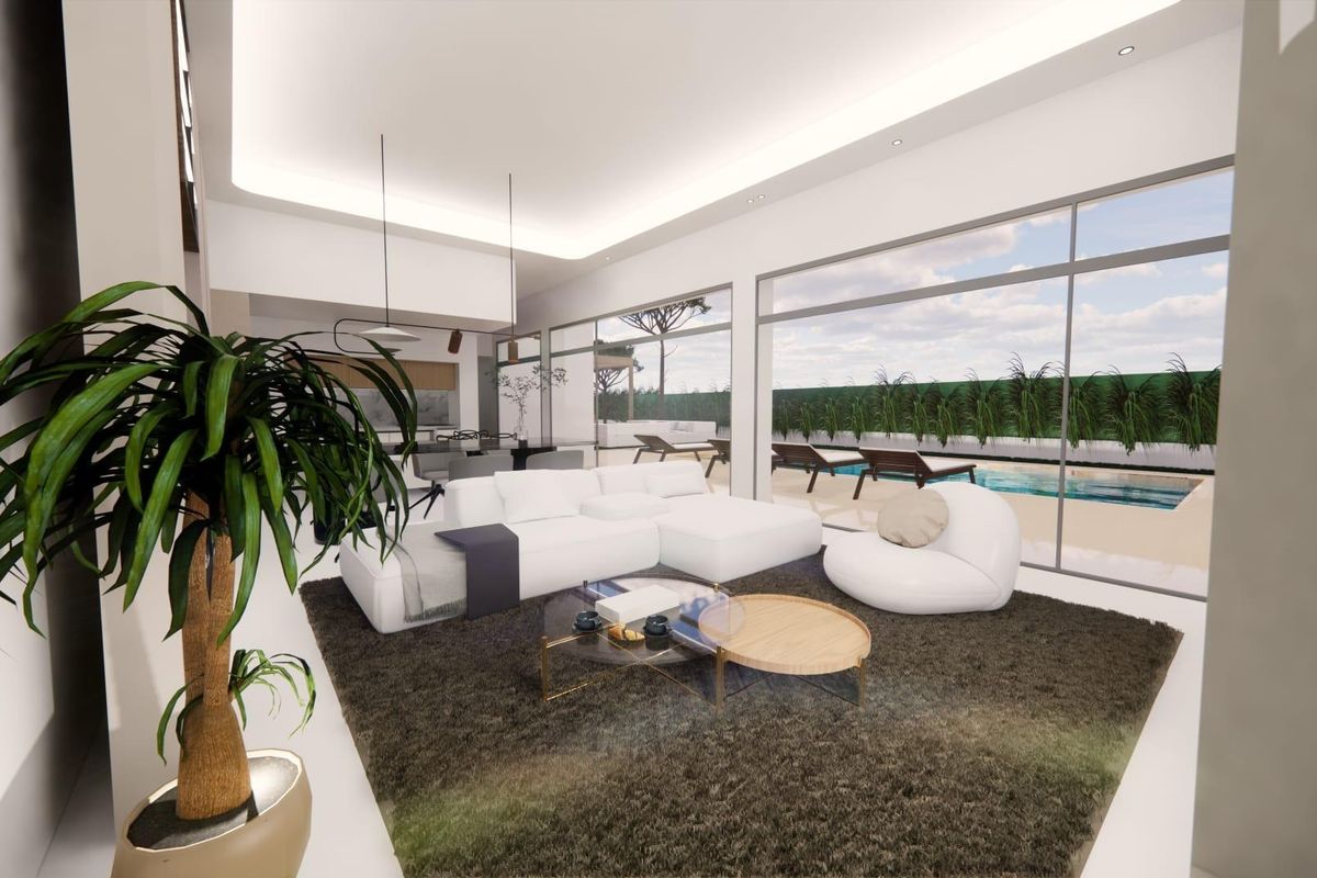 Ruime woonkamer van de villa met grote ramen en uitzicht op het zwembad, gelegen in Pilar de La Horadada.