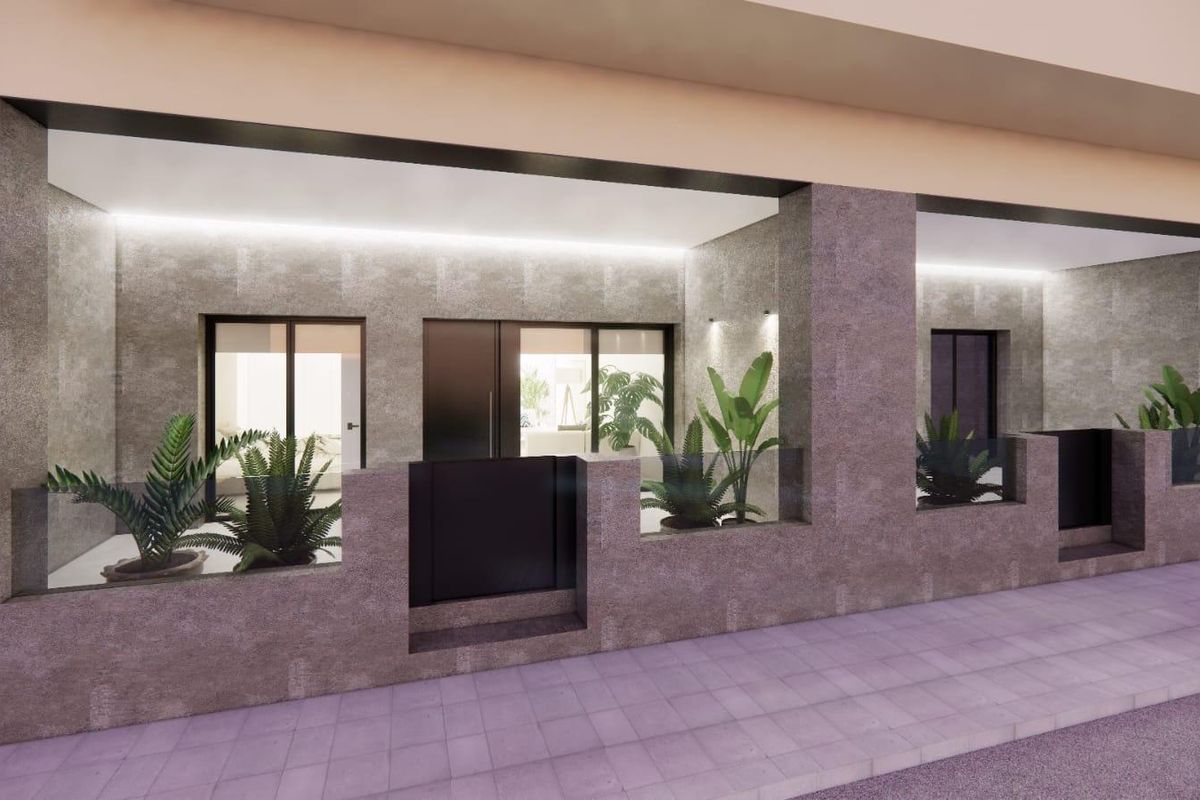 Buitenkant van een 1-slaapkamer appartement op de begane grond in Catral, met een modern ontwerp en weelderige planten.