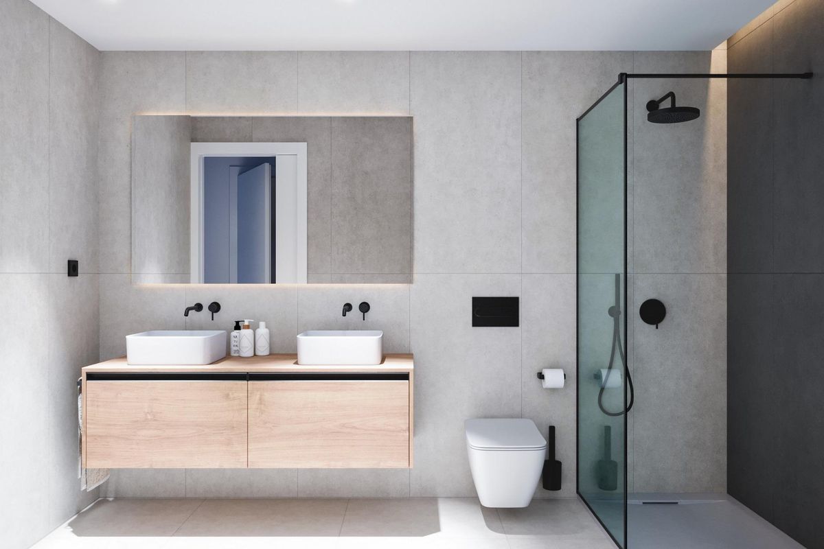 Contemporary badkamer met strakke afwerkingen en moderne armaturen in de 3-slaapkamer bungalow in Pilar de La Horadada.