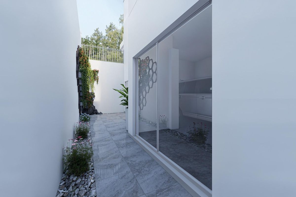 Schattig zijpad dat leidt naar de tuin van een 3-slaapkamer townhouse in Los Alcazares.