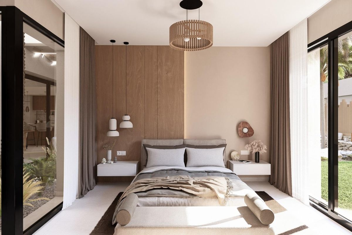 Een andere uitnodigende slaapkamer in de villa, met grote ramen en een serene uitzicht in Baños y Mendigo.