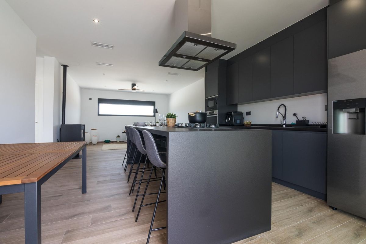 Stylish kitchen view in a Pinoso 3-bed villa, showcasing a contemporary design and open layout.