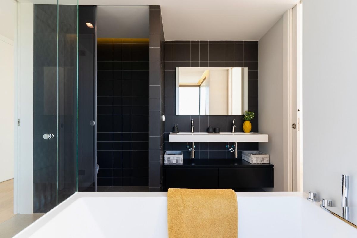 Stylish hallway leading to a bathroom and bedroom in a modern villa in Benitachell, Costa Blanca.