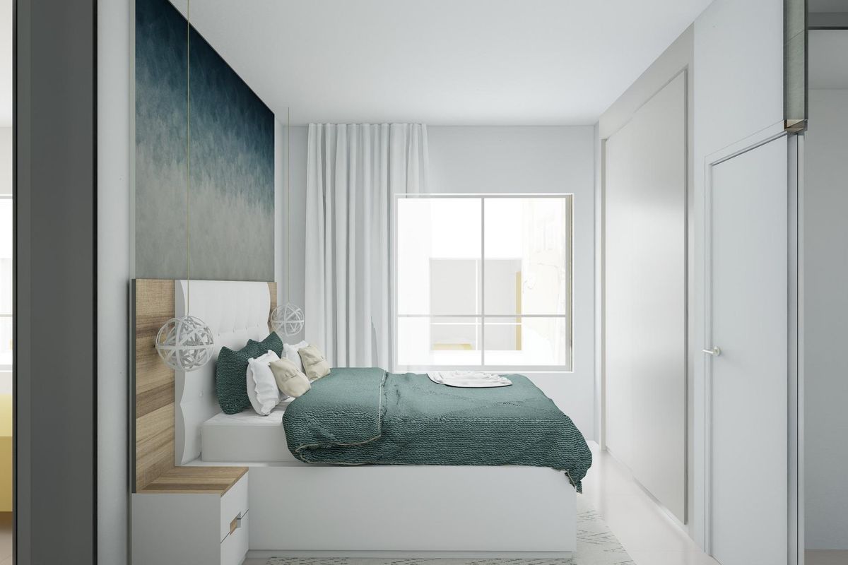 Serene slaapkamer in een 3-slaapkamer townhouse in Los Alcazares, uitgerust met moderne meubels.