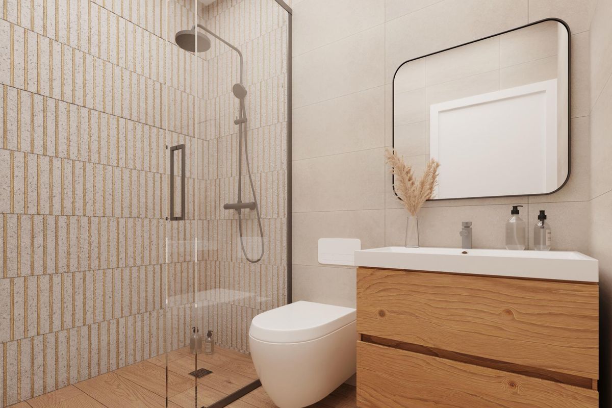 Chique badkamer met betegelde muren en een stijlvolle wastafel in de villa in Mutxamel.