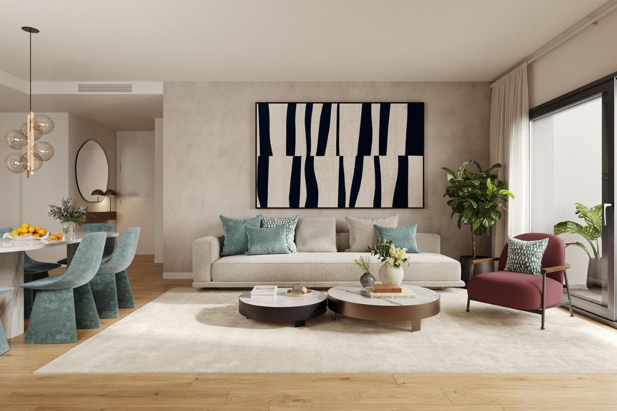 Heldere woonkamer met moderne meubels, open naar een terras, in een penthouse in Casares.