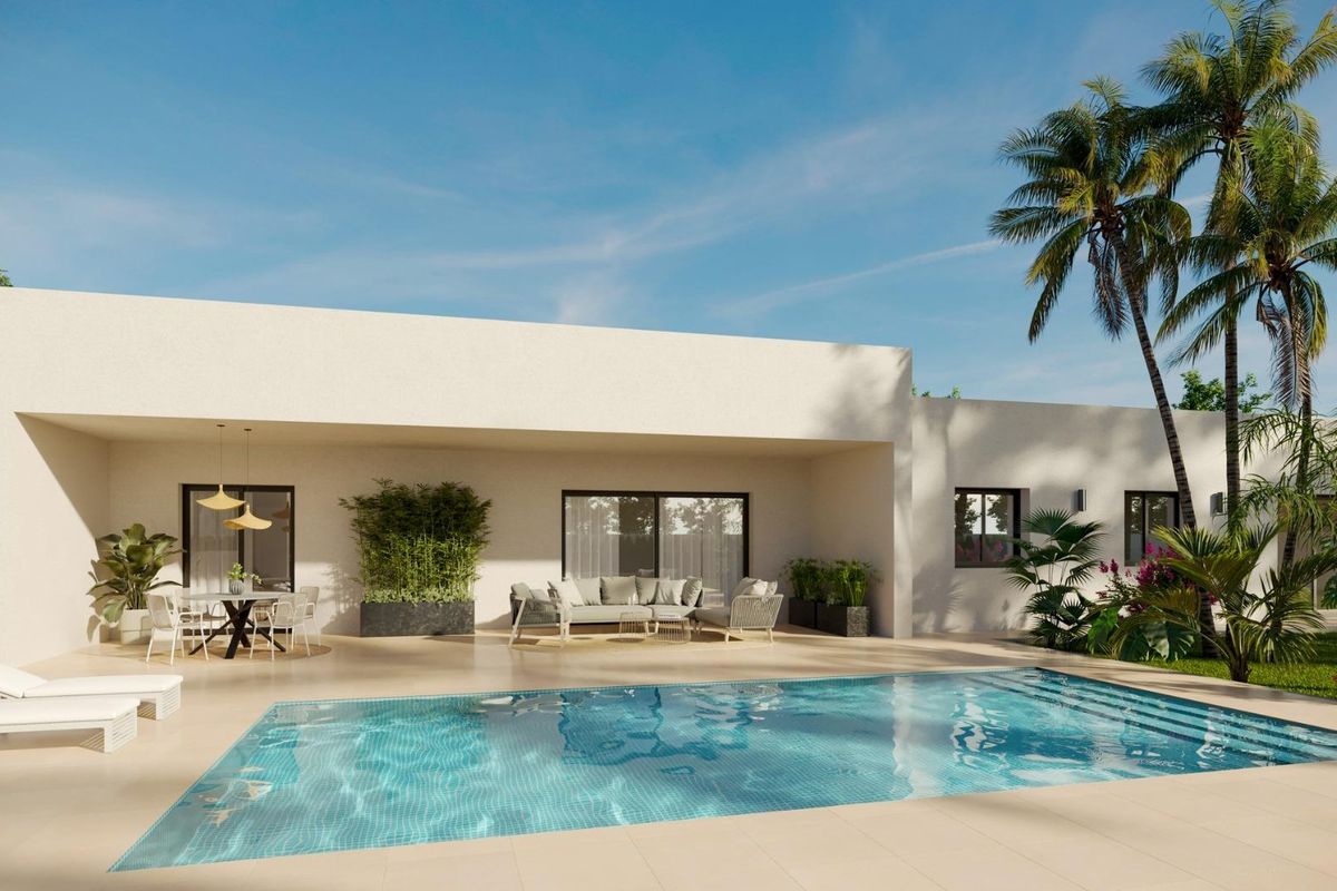 Moderne 3-slaapkamer villa in Aspe met een zwembad, terras en palmbomen. Perfect voor buitenleven.