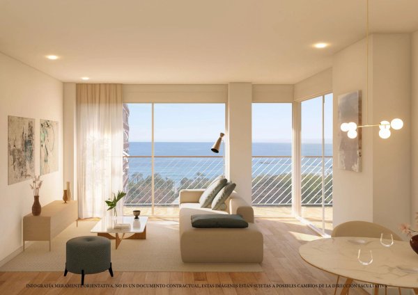 Heldere woonkamer met uitzicht op zee in een penthouse in Villajoyosa met modern ontwerp en comfort.