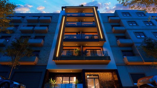 Moderne buitenkant van een 2-slaapkamer penthouse in Torrevieja, met stijlvolle verlichting en balkons.