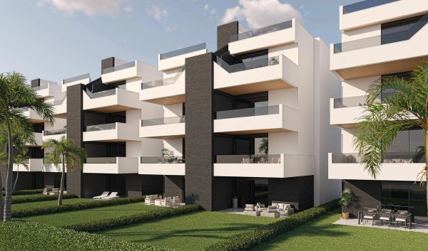 Buitenkant van een modern 2-slaapkamer appartementcomplex in Alhama De Murcia, met balkons en aangelegde tuinen.