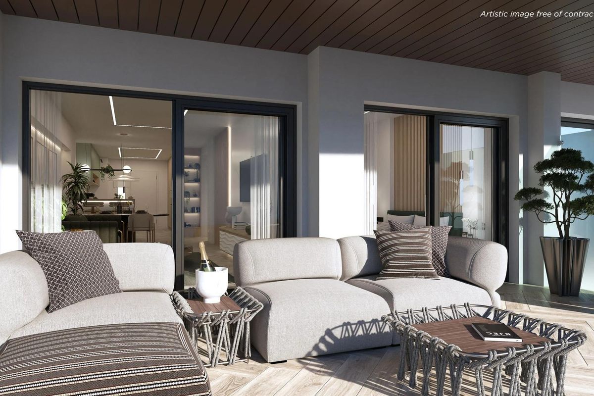 Cozy terrace area with modern seating overlooking the pool, La Manga del Mar Menor, Costa Calida, Spain.