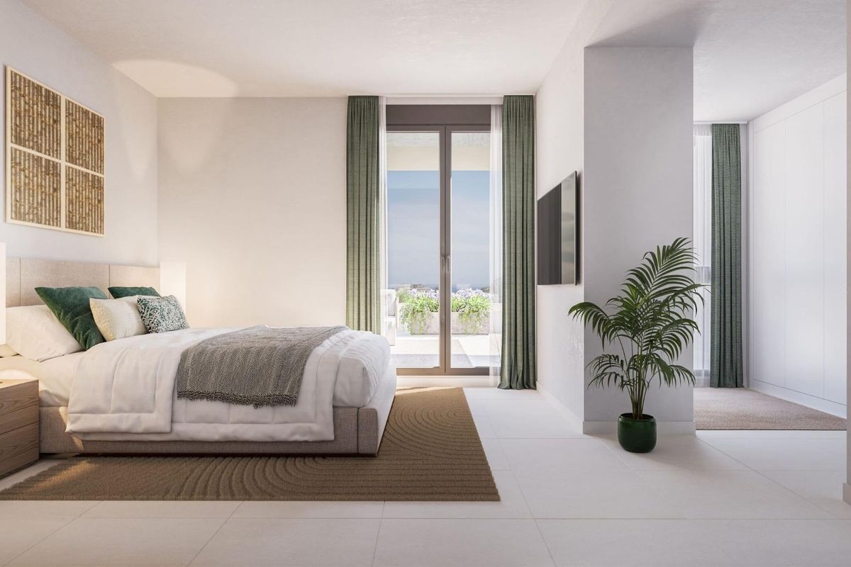 Stijlvolle slaapkamer met natuurlijk licht en modern design in een 2-slaapkamer penthouse in Estepona.