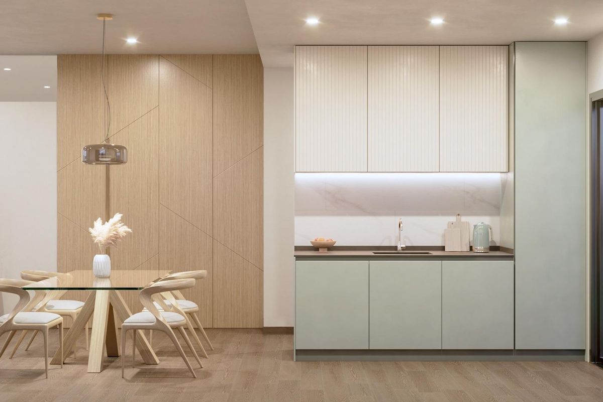 Strakke keuken in San Pedro del Pinatar met moderne apparaten en stijlvolle kasten.