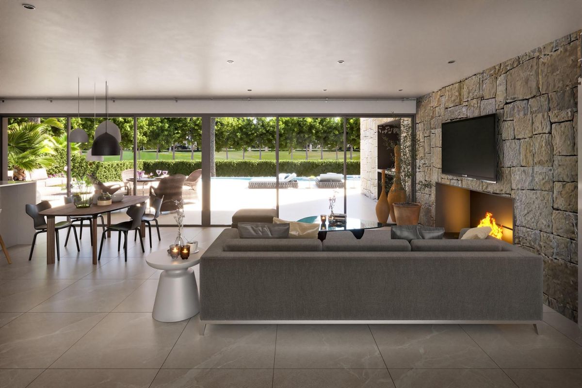 Uitnodigende woonkamer met open indeling en uitzicht op het vuur, dicht bij het zwembad in Cuevas Del Almanzora, Costa de Almeria.