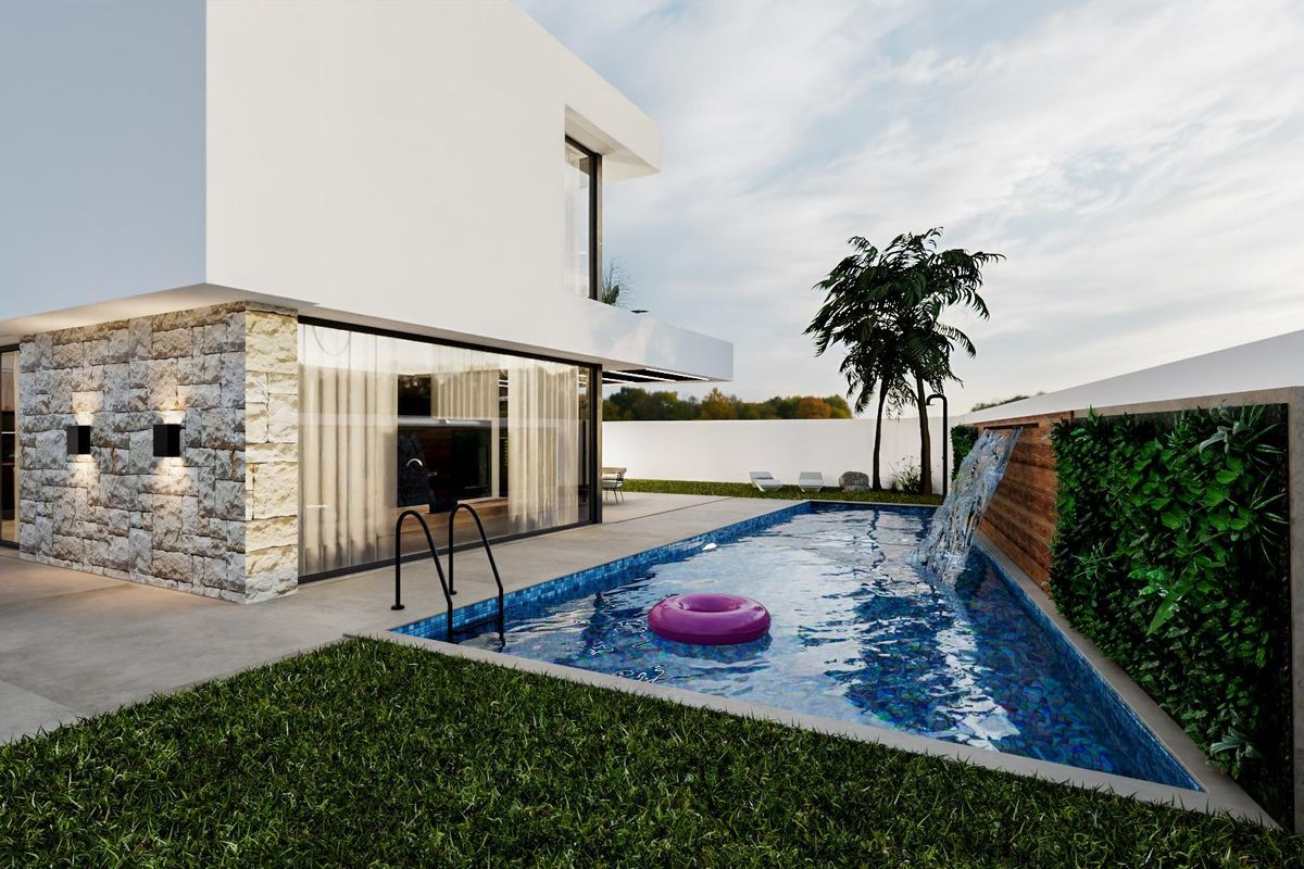 Levendig zwembad met loungegedeelte naast de moderne villa in Orihuela Costa, Spanje.