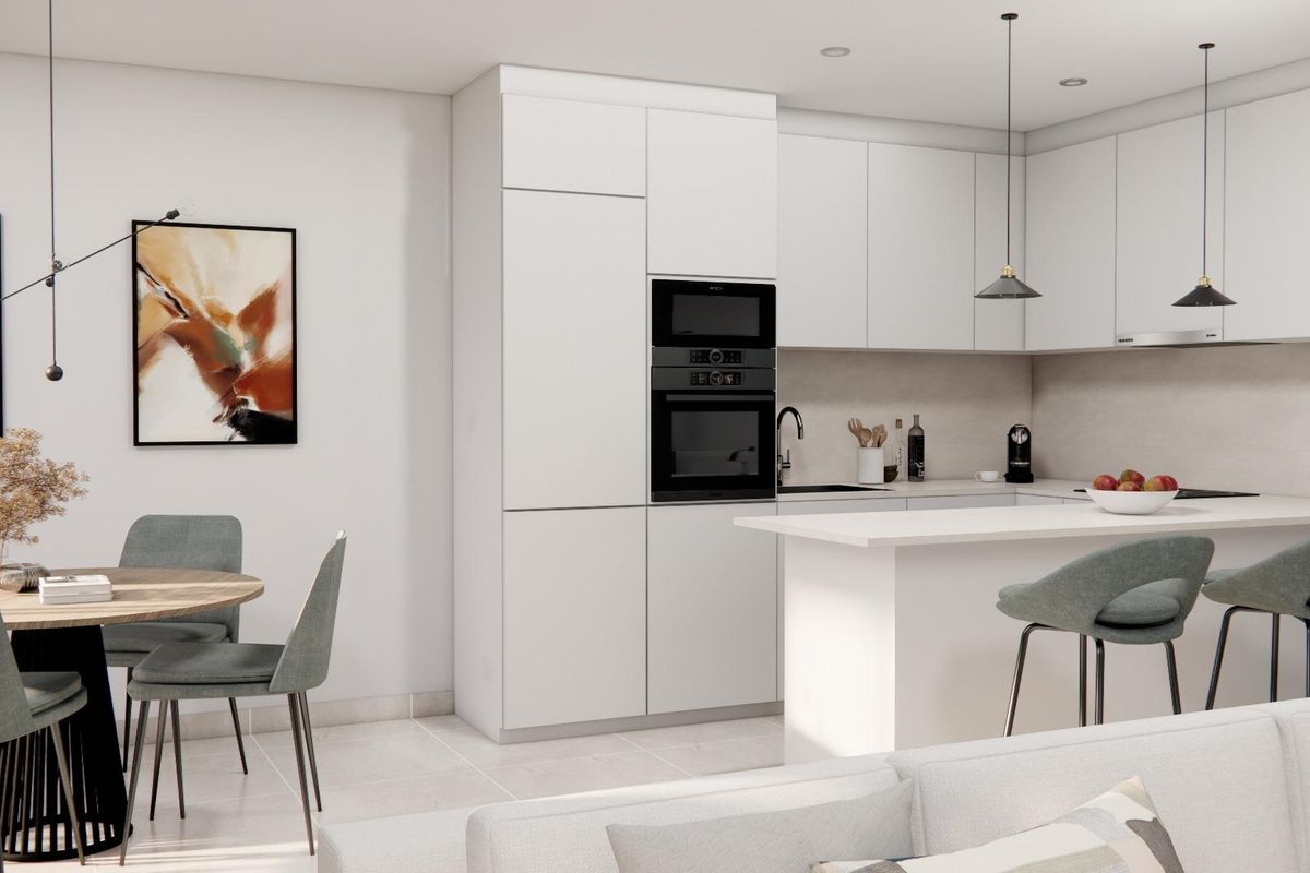 Een ander uitzicht op de keuken, met modern design en eetruimte in de townhouse van Rojales.