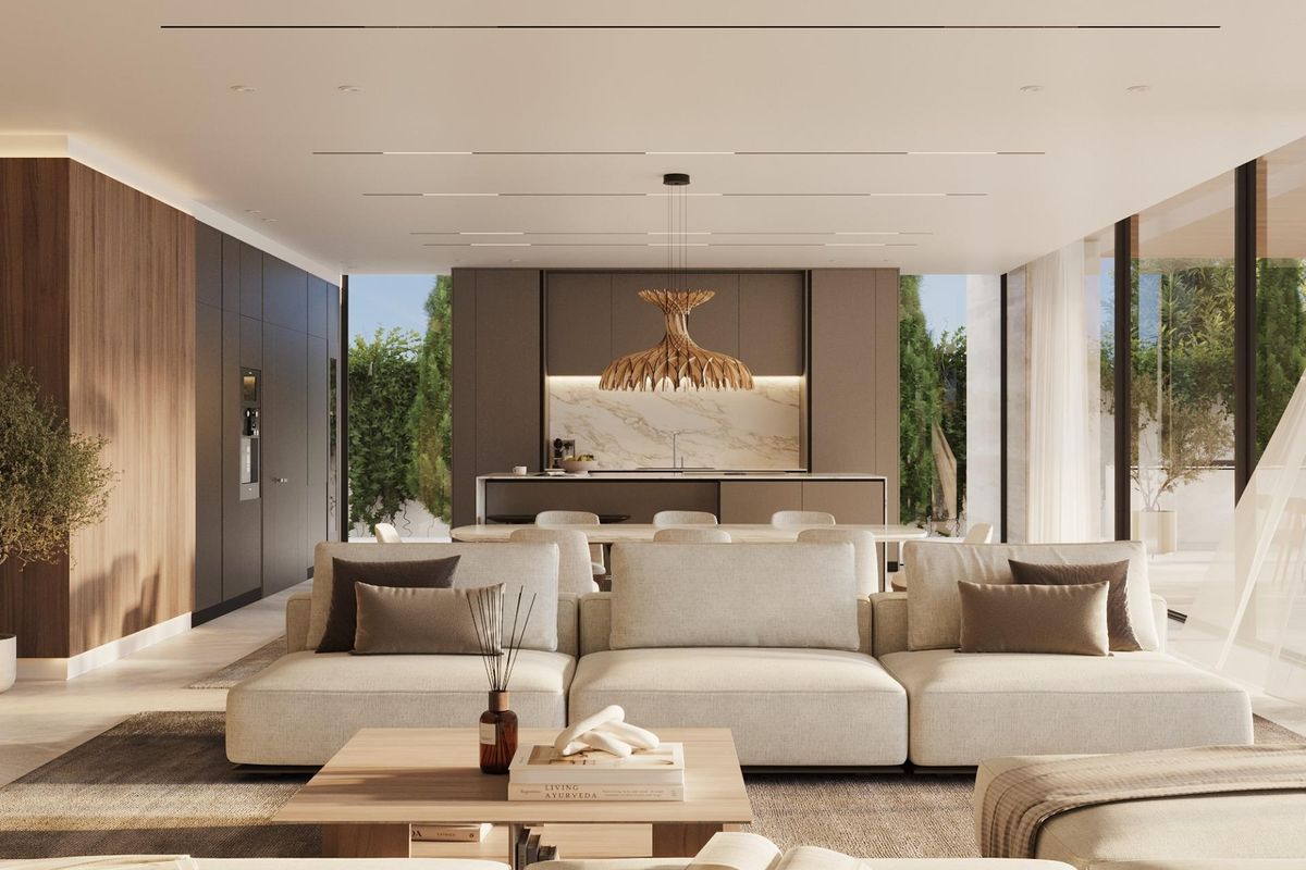 Elegante woonkamer gericht op moderne elegantie met uitzicht op buitenruimtes in de villa in Benahavís.