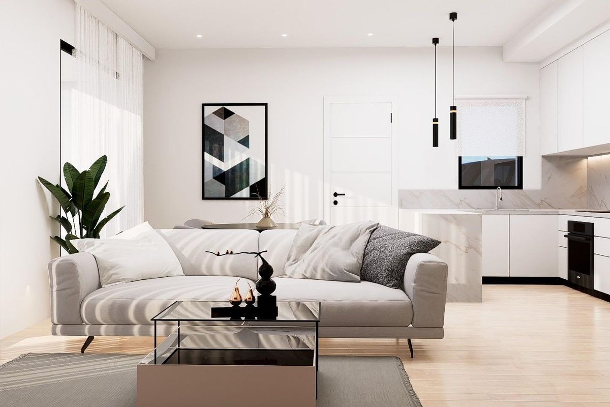 Stijlvolle woonkamer met een open keuken in een 3-slaapkamer townhouse in Orihuela Costa.