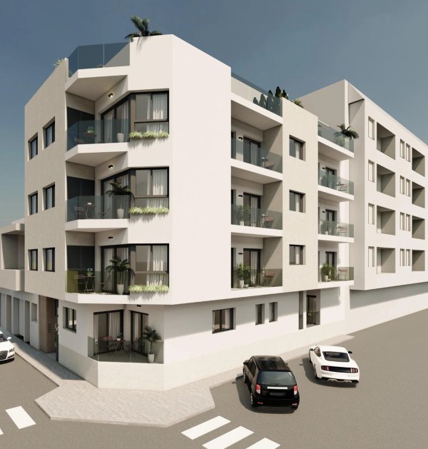 Moderne 2-slaapkamerappartement buitenkant in Guardamar del Segura, met balkons en groenvoorziening.