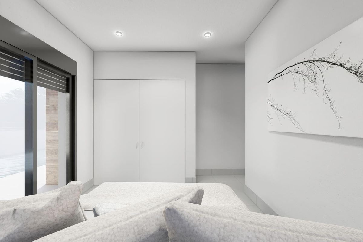 Functionele ruimte die de bank en kast toont in de derde slaapkamer van een 3-slaapkamer townhouse in Torre Pacheco.