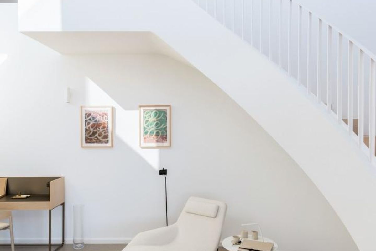 Stylish sitting area in a 4-bed villa, featuring a modern design and elegant staircase in Benitachell.