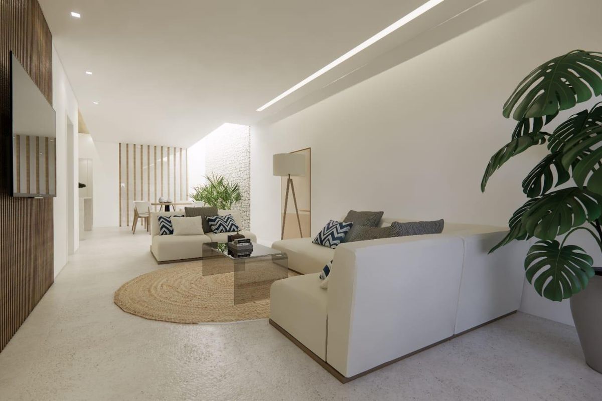 Stijlvolle woonkamer in het appartement met comfortabele banken en decoratieve elementen, gelegen in Catral.