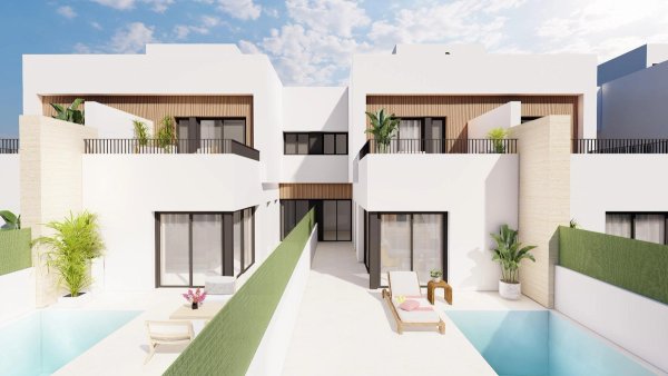 Buitenkant van een modern 3-slaapkamer townhousecomplex in Santiago de la Ribera, met een gedeeld zwembad.