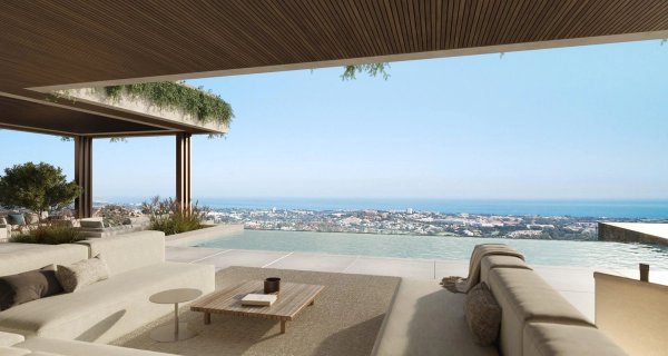 Moderne villa terras met panoramisch uitzicht op Benahavís en de Costa del Sol. Ruimtelijke zithoek buiten.