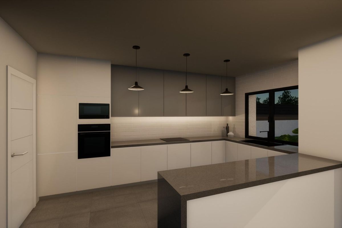 Modern kitchen in a 3-bed villa in Pinoso, featuring sleek cabinets and stylish pendant lights.