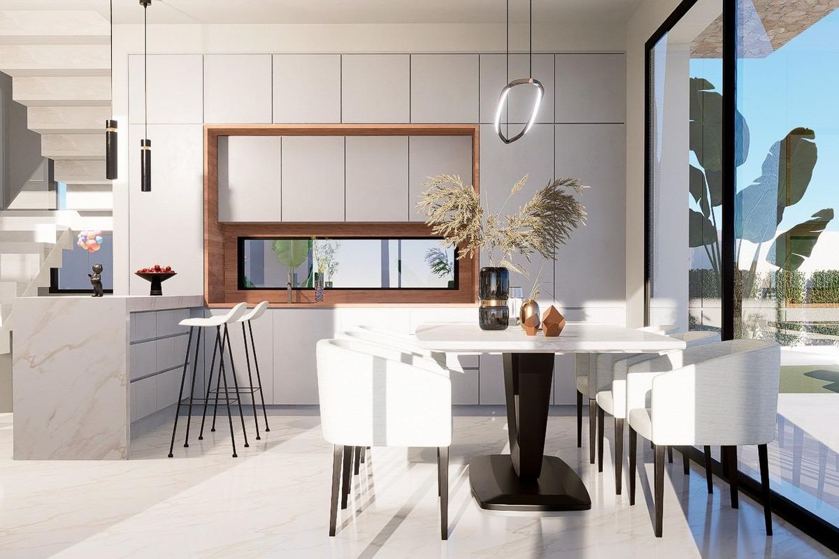 Moderne eetruimte in een 3-slaapkamer villa in Finestrat, met elegante decoratie en veel licht.