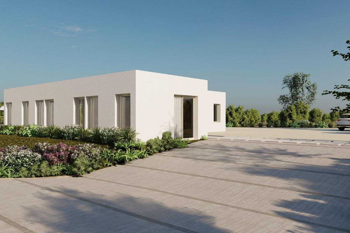 Moderne villa buitenkant met aangelegde tuin en parkeerplaats in Algorfa, Costa Blanca Zuid.