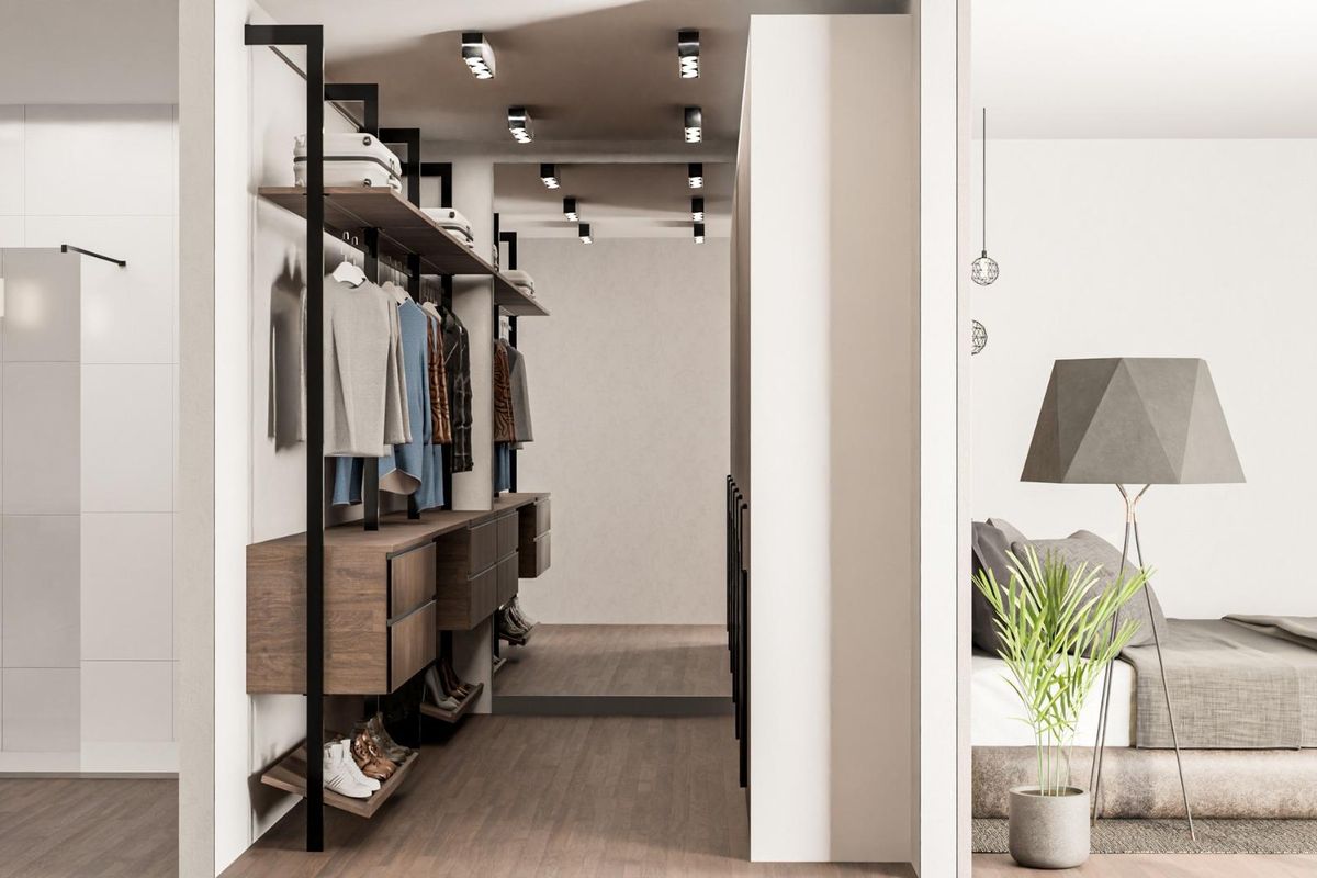 Spacious walk-in closet connecting to a modern bedroom, in a 3-bedroom villa located in Pinoso, Costa Blanca.