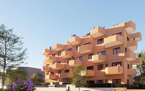 Exterior view of the Sunrise Beach apartments in El Campello. Modern building architecture with individual balconies.