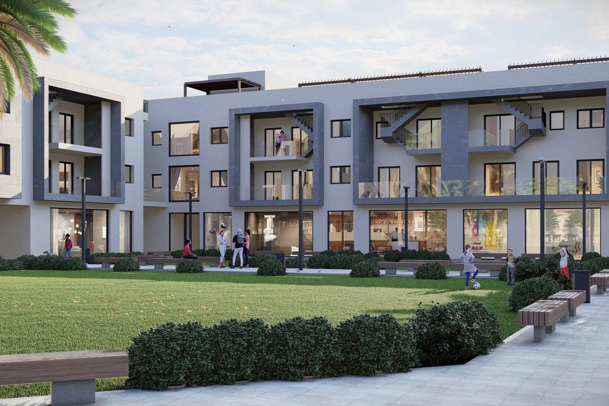 Architectonisch detail van het appartementencomplex in Torre Pacheco, met groene ruimtes en modern ontwerp.