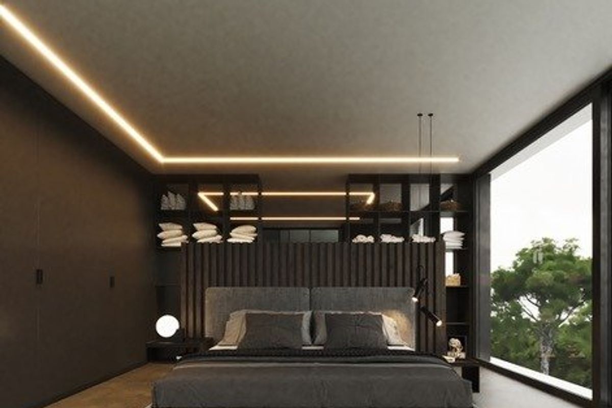 Comfortabele slaapkamer met stijlvolle verlichting en decor in een moderne villa in Altea, Costa Blanca Noord.