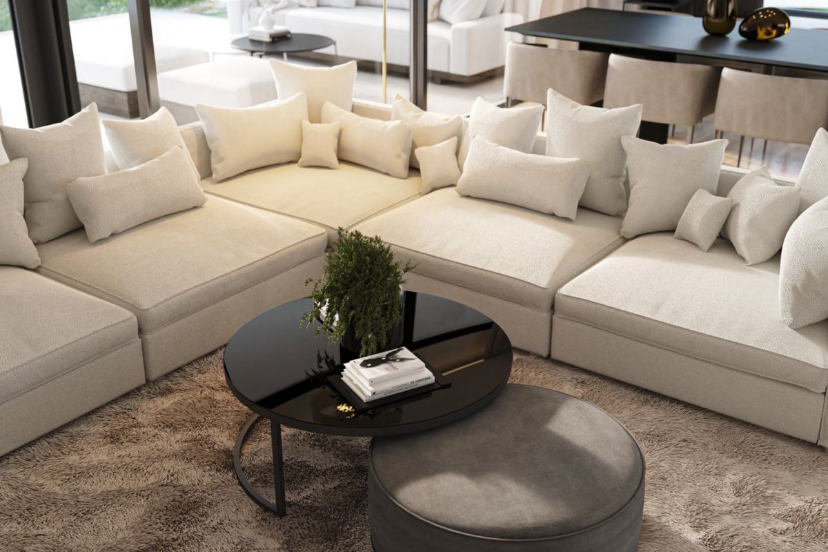 Gezellige zithoek in een penthouse, met plush kussens en een elegant salontafel in Orihuela.