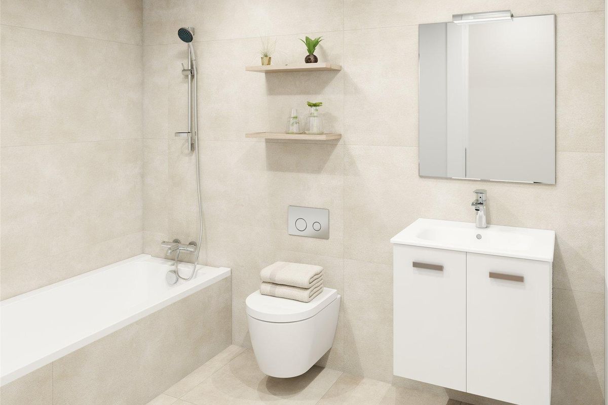 Moderne badkamer met een bad, douche en strakke wastafel in een 2-slaapkamer appartement in Torremolinos.