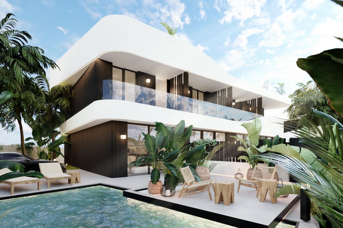 Moderne 3-slaapkamer townhouse met zwembad omringd door weelderig groen in Orihuela Costa, Costa Blanca.