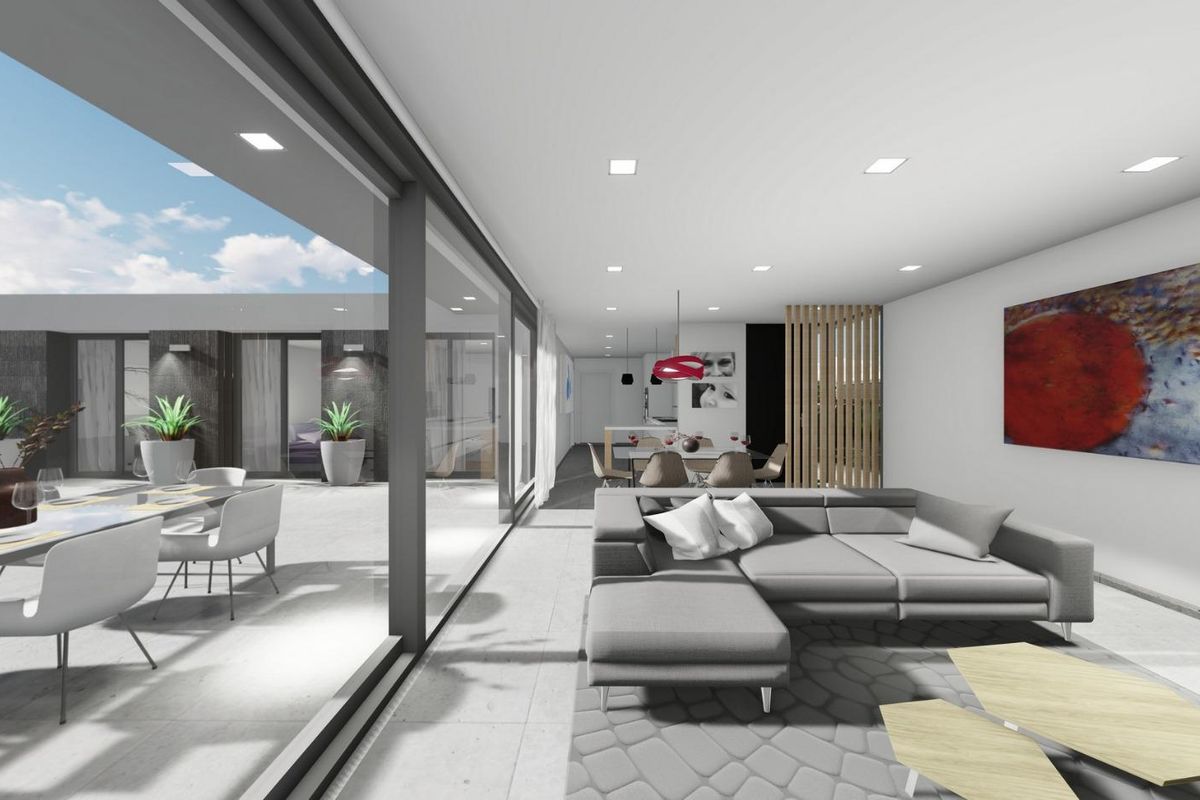 Heldere woonkamer en eetkamer met open uitzicht in een moderne villa, gelegen in San Juan de los Terreros.