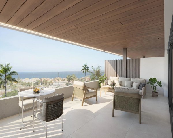 Ruim terras met zeezicht in een moderne 2-slaapkamer appartement in Manilva, Costa del Sol.