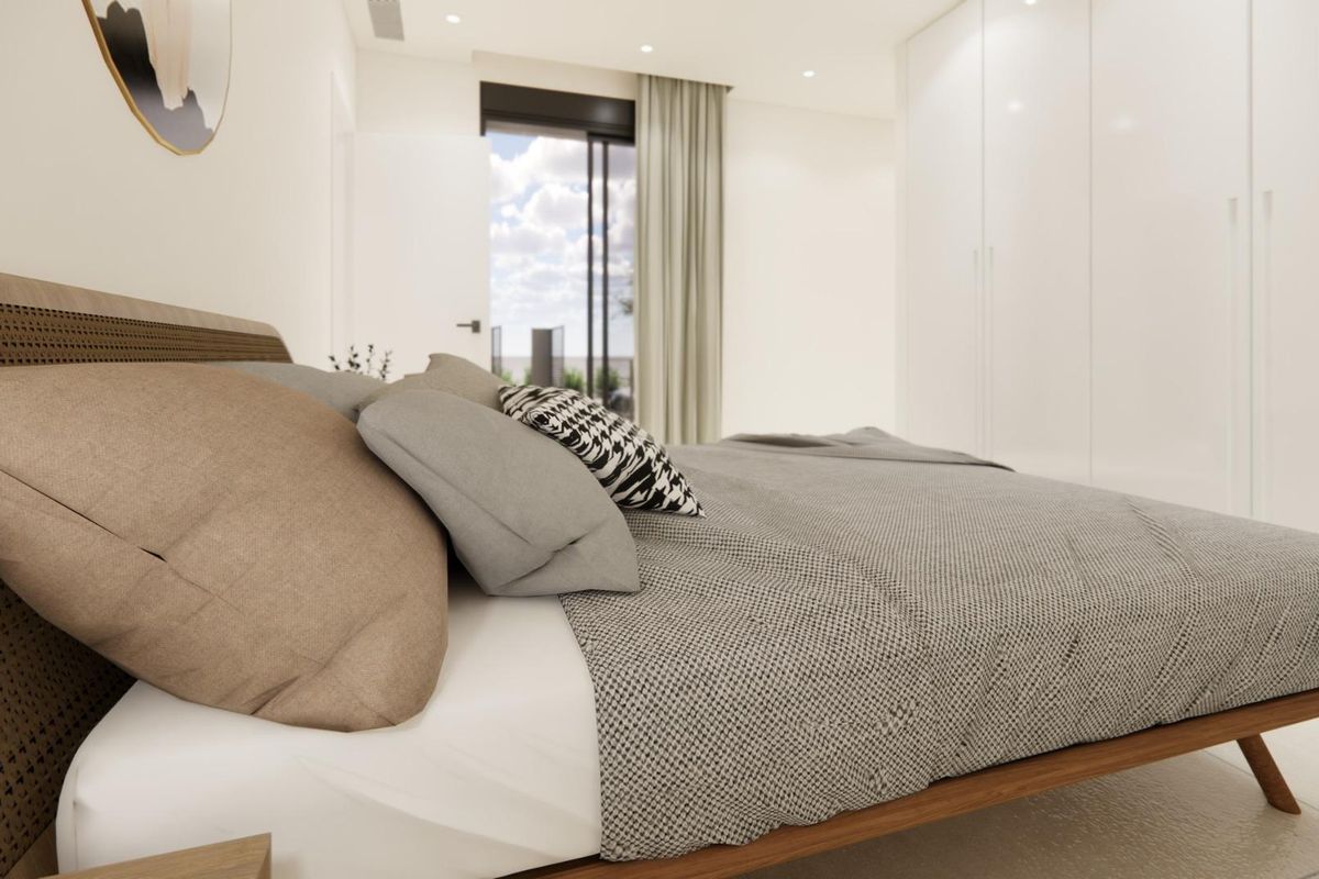 Gezellige slaapkamer met uitzicht op een comfortabel bed in de moderne bungalow in Dolores.