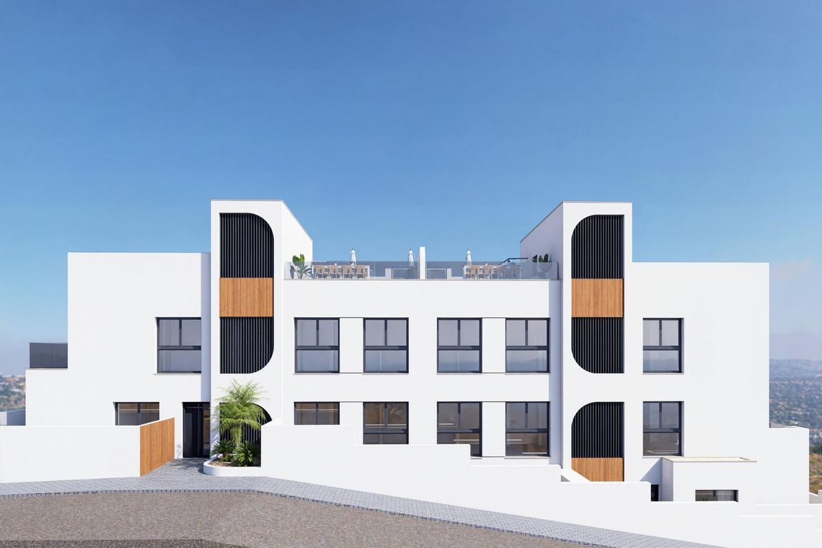 Voorkant van een modern appartementencomplex in Benijofar met strakke lijnen en moderne architectuur.