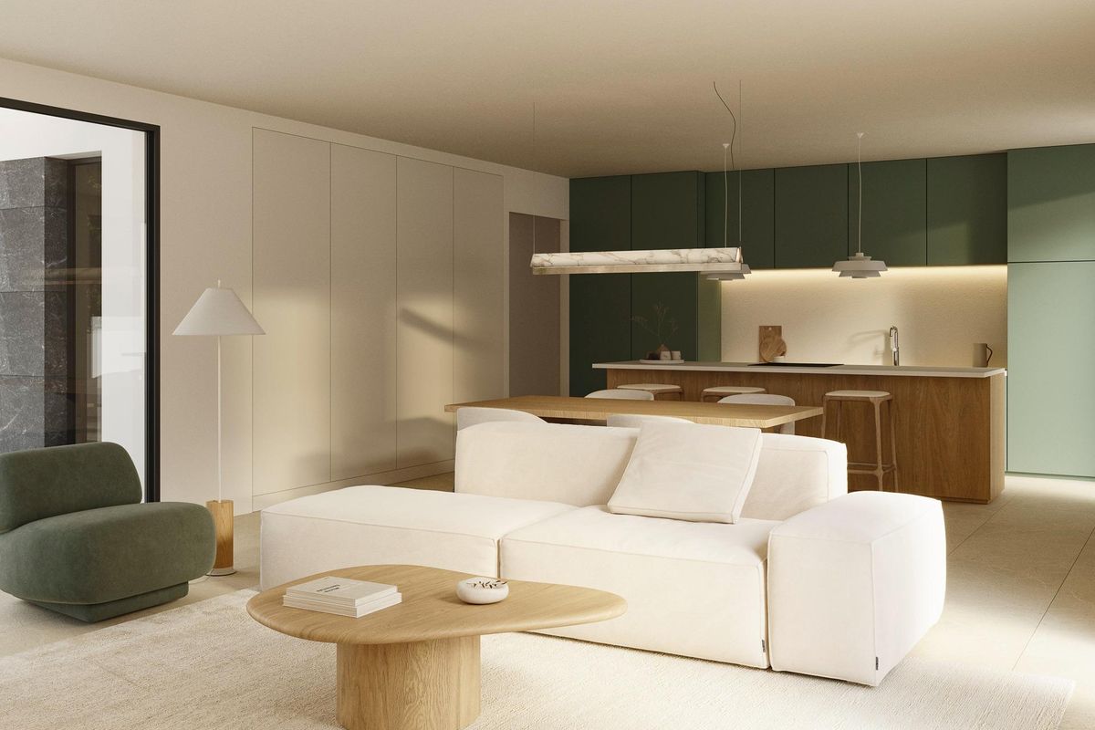 Ruime woonkamer van de villa met elegante meubels en een moderne keuken in Polop, Costa Blanca Noord.