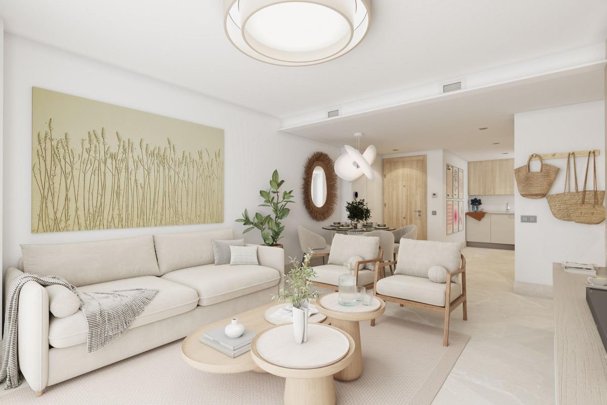 Heldere interieur van een woonkamer in een 3-slaapkamer penthouse in Mijas, met chique decor en moderne voorzieningen.