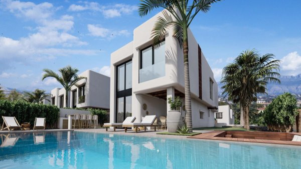 Moderne 4-slaapkamer villa in Alfas del Pi, Costa Blanca Noord met een zwembad en een weelderige tuin.