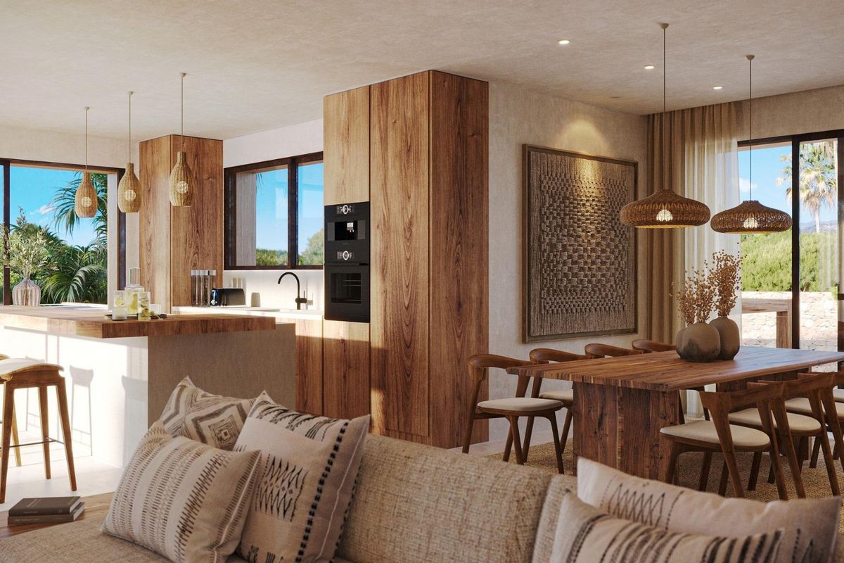 Ruime interieur van een 3-slaapkamer villa in Jávea, met een stijlvolle open keuken en eetruimte.